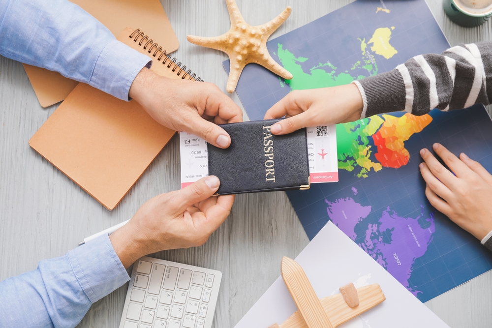 Travel agent giving documents